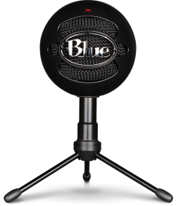 A round microphone with desk stand.